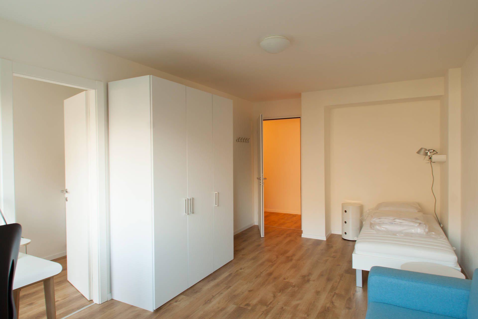 interni-stanza-ampliamento-in-legno-appartamenti-in-bioedilizia-